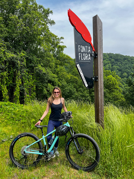 Christine with bike at Fonta Flora Trail