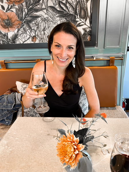 Christine with wine at Gemelli